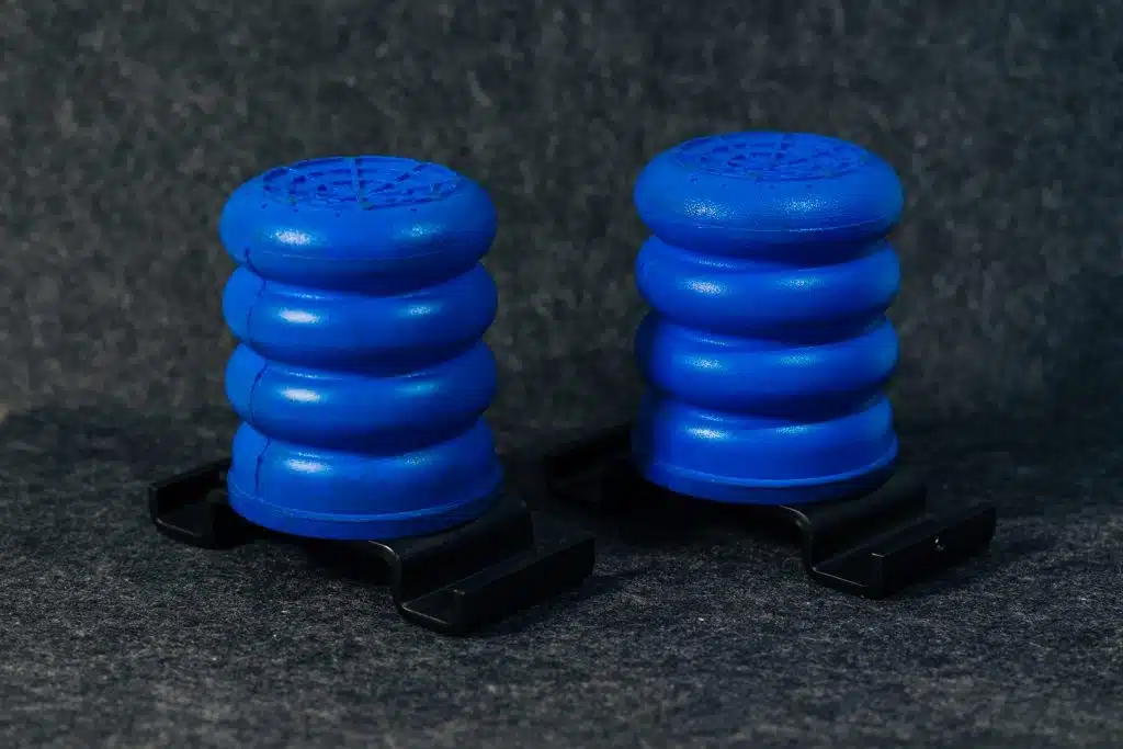 Blue SumoSprings and brackets for Toyota Tacoma for Airbags vs bump stops vs SumoSprings