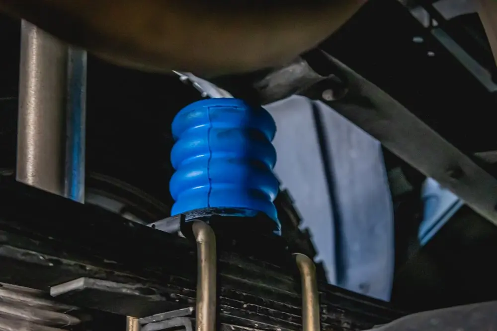 Blue SumoSprings installed on a Toyota Tacoma