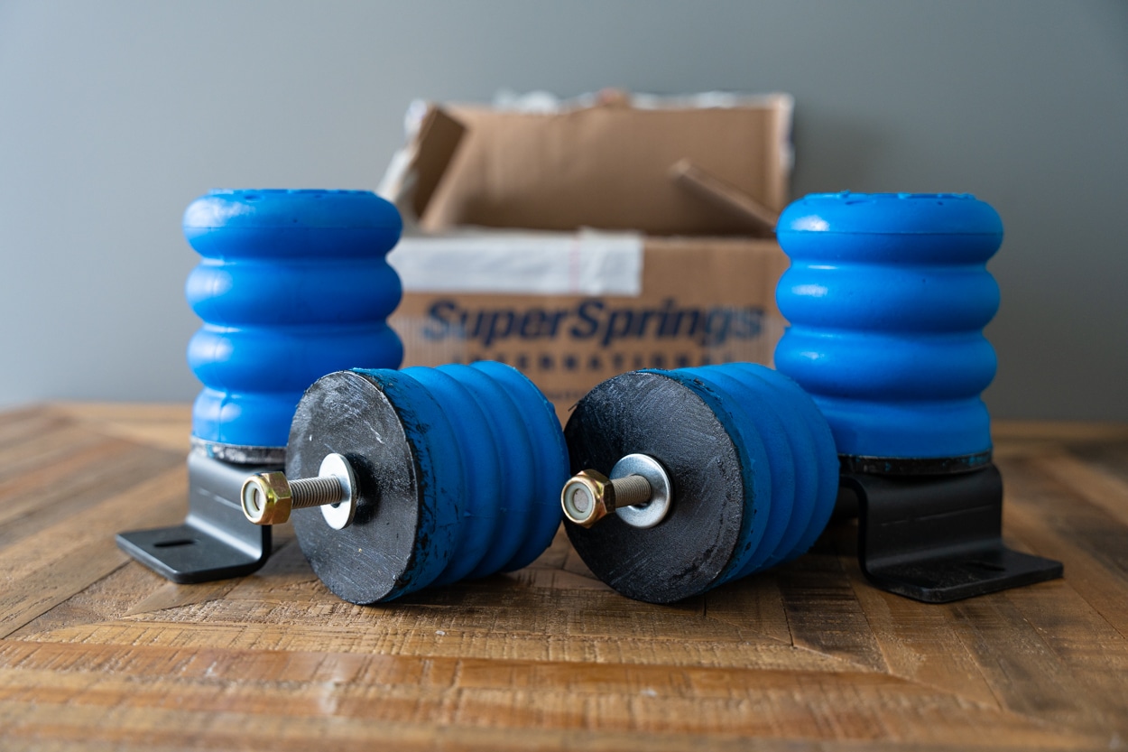 Front and Rear Blue SumoSprings on table with box