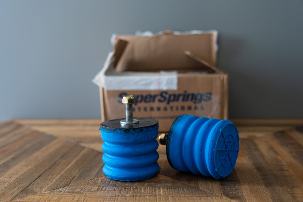 Front Blue SumoSprings on table with box for 4Runner