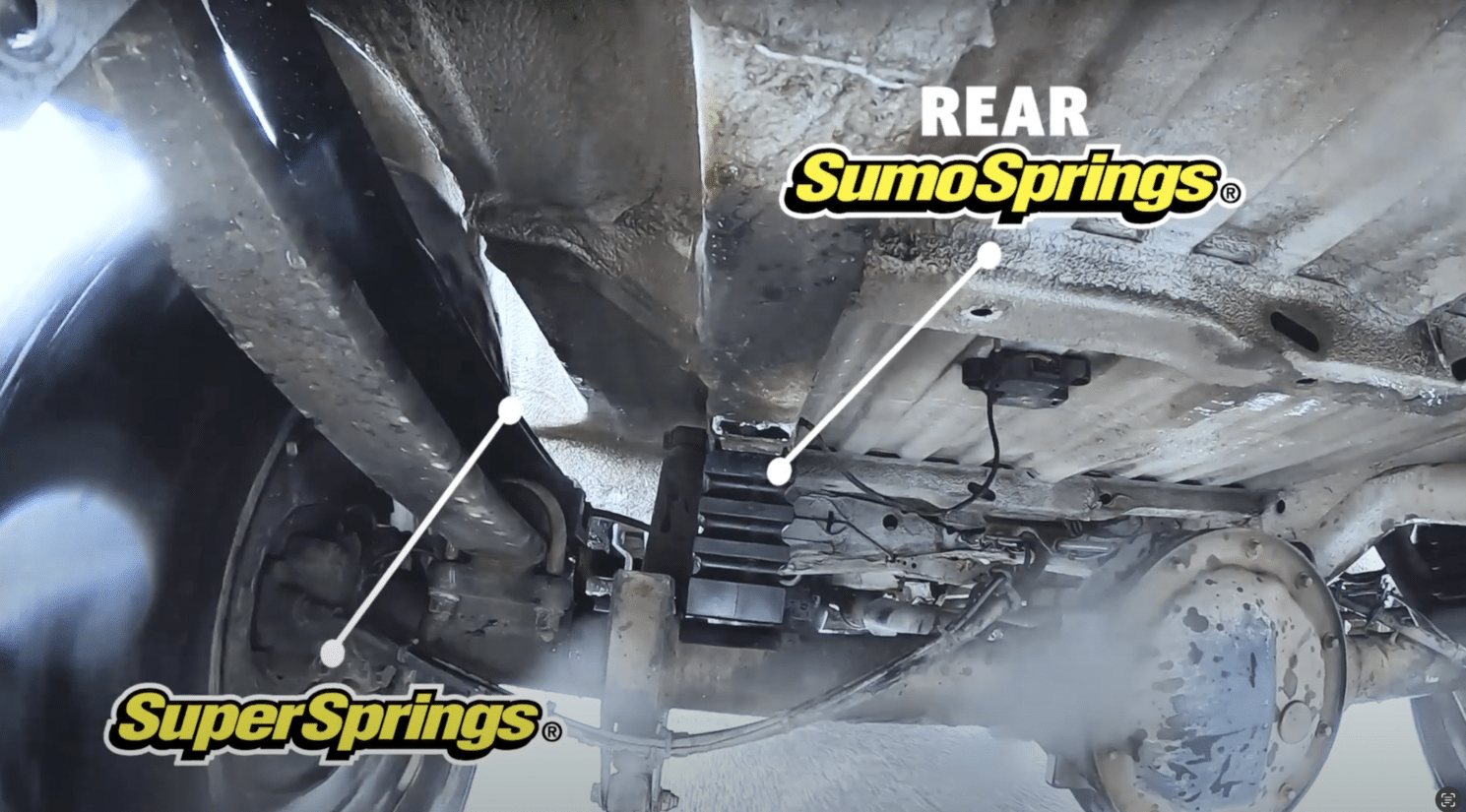 SumoSprings and SuperSprings installated on a van driving down the road