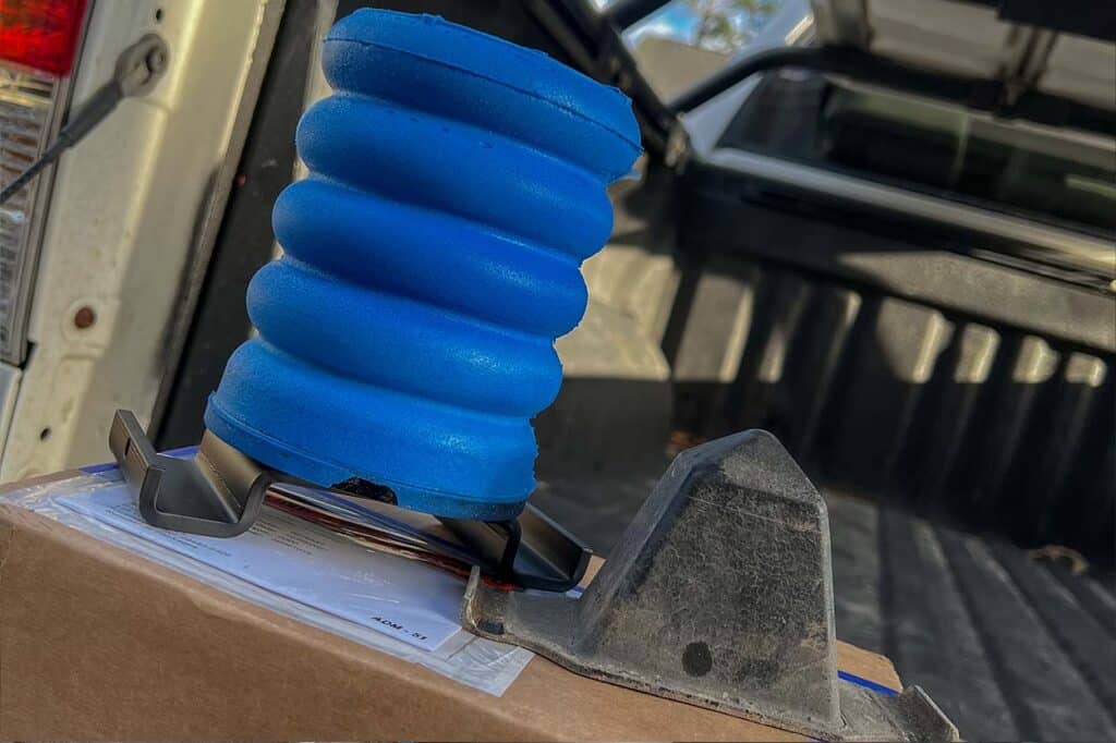 Blue SumoSprings compared to OEM Toyota bump stop